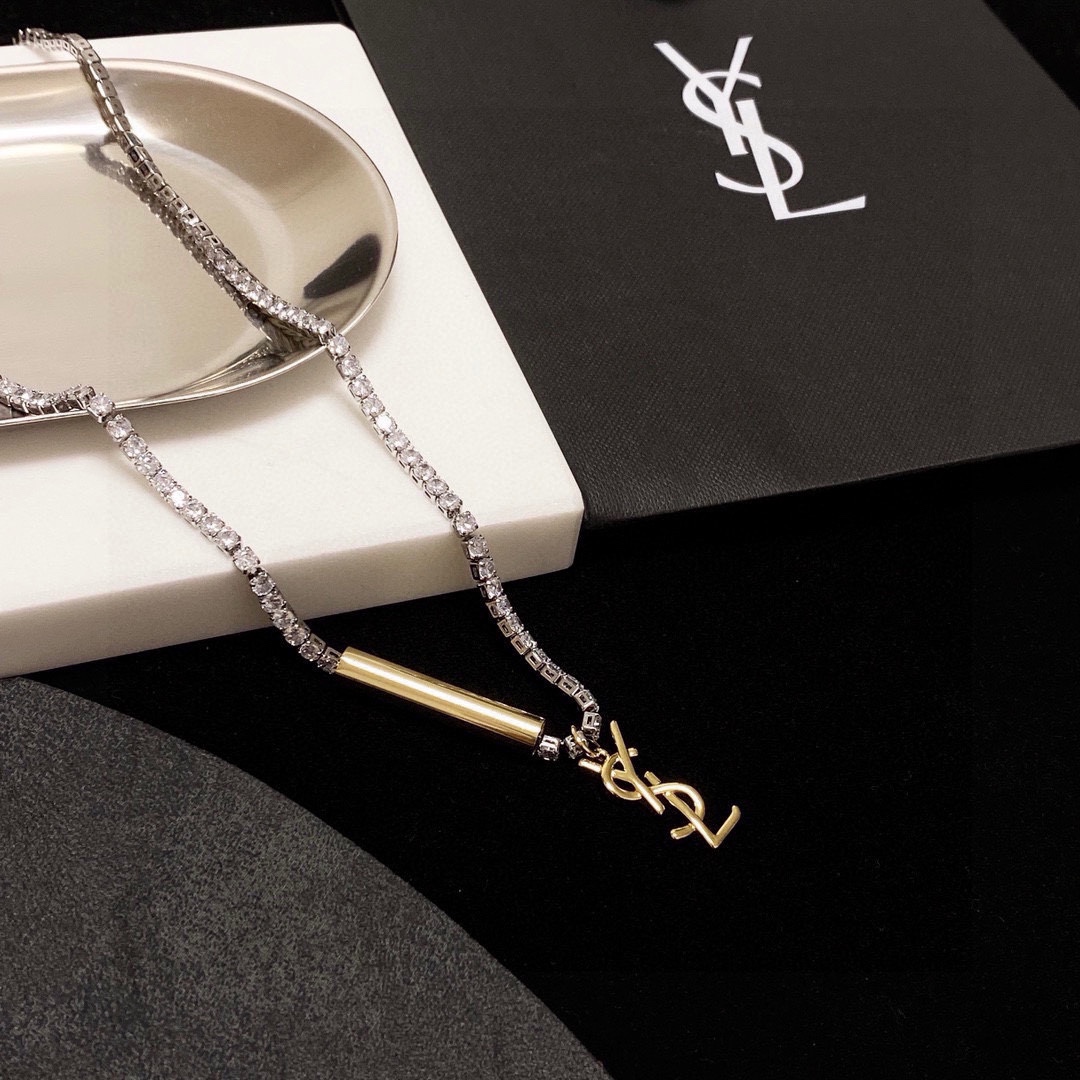 Saint Laurent Cassandre YSL Monogram Crystal Tennis Choker necklace silver-toned metal with clear faceted crystals gold-toned metal logo and bar accent 40cm with 5cm extender