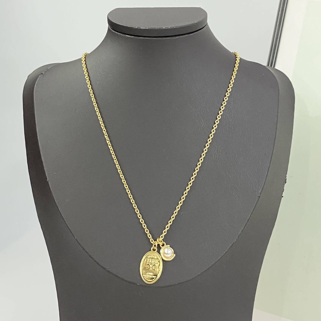 Celine Triomphe Oval Pearl Pendant necklace gold-tone metal with white pearl 45cm with 5cm extender