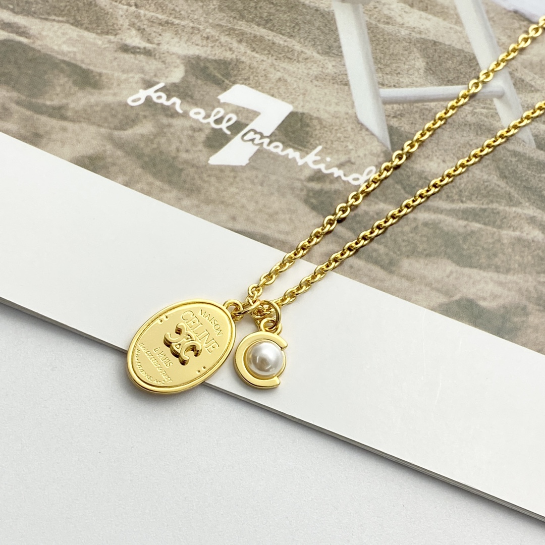 Celine Triomphe Oval Pearl Pendant necklace gold-tone metal with white pearl 45cm with 5cm extender