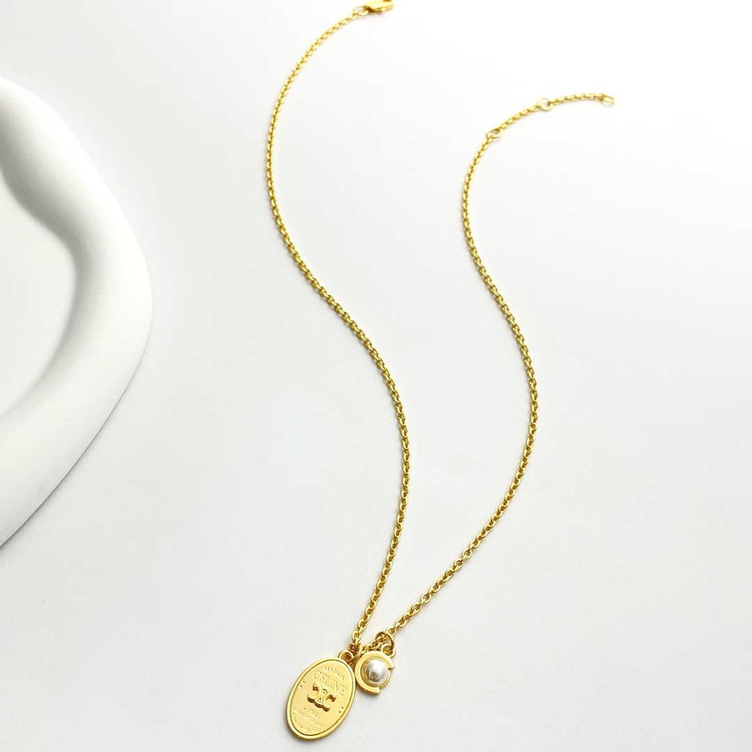 Celine Triomphe Oval Pearl Pendant necklace gold-tone metal with white pearl 45cm with 5cm extender
