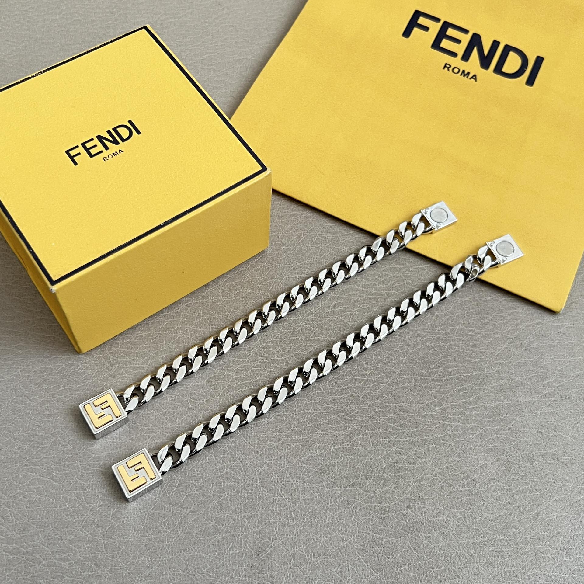 Fendi FF Logo Cuban Chain bracelet Silver-tone metal with gold-tone FF logo accent 20cm