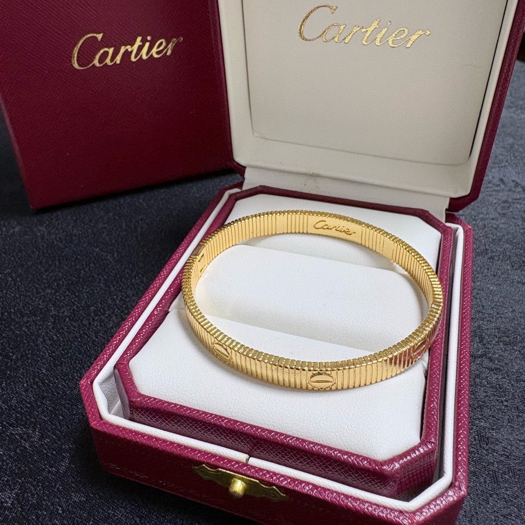 Cartier Love Ribbed Cuff bracelet 18k yellow gold 18k white gold no gemstones 17