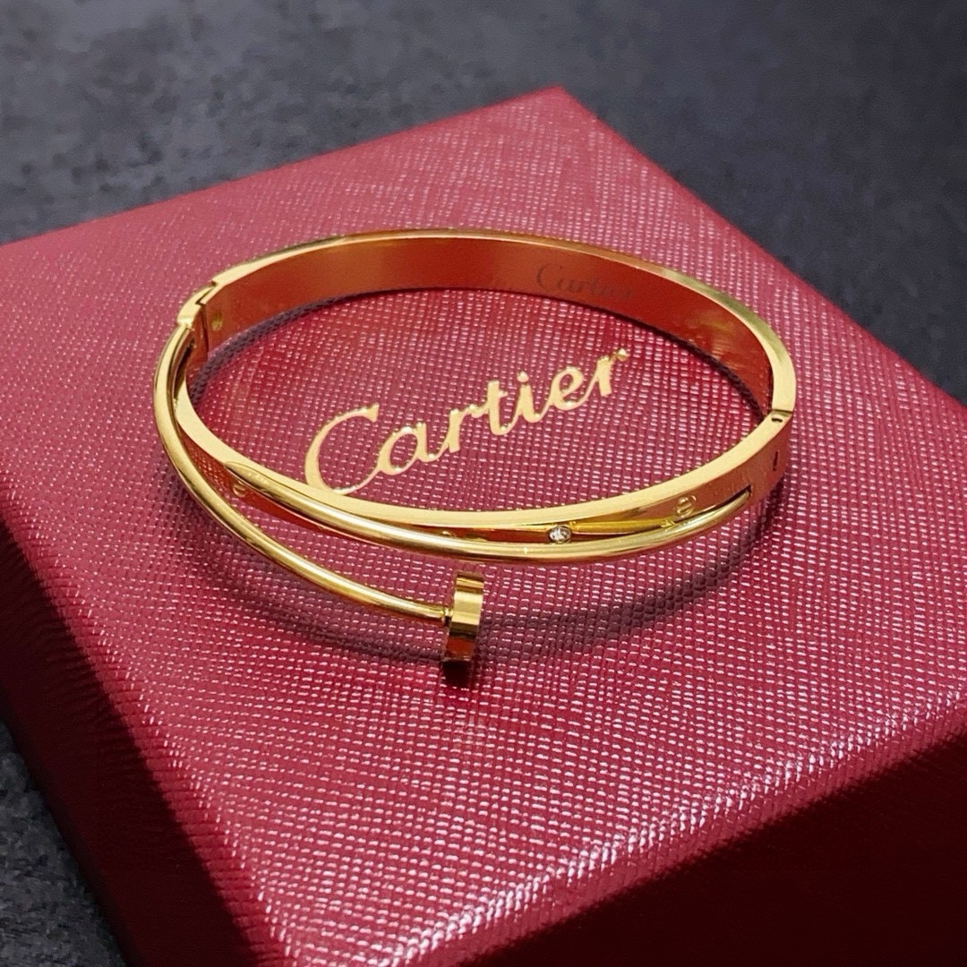 Cartier Juste un Clou bracelet 18k yellow gold with clear diamond accents 17
