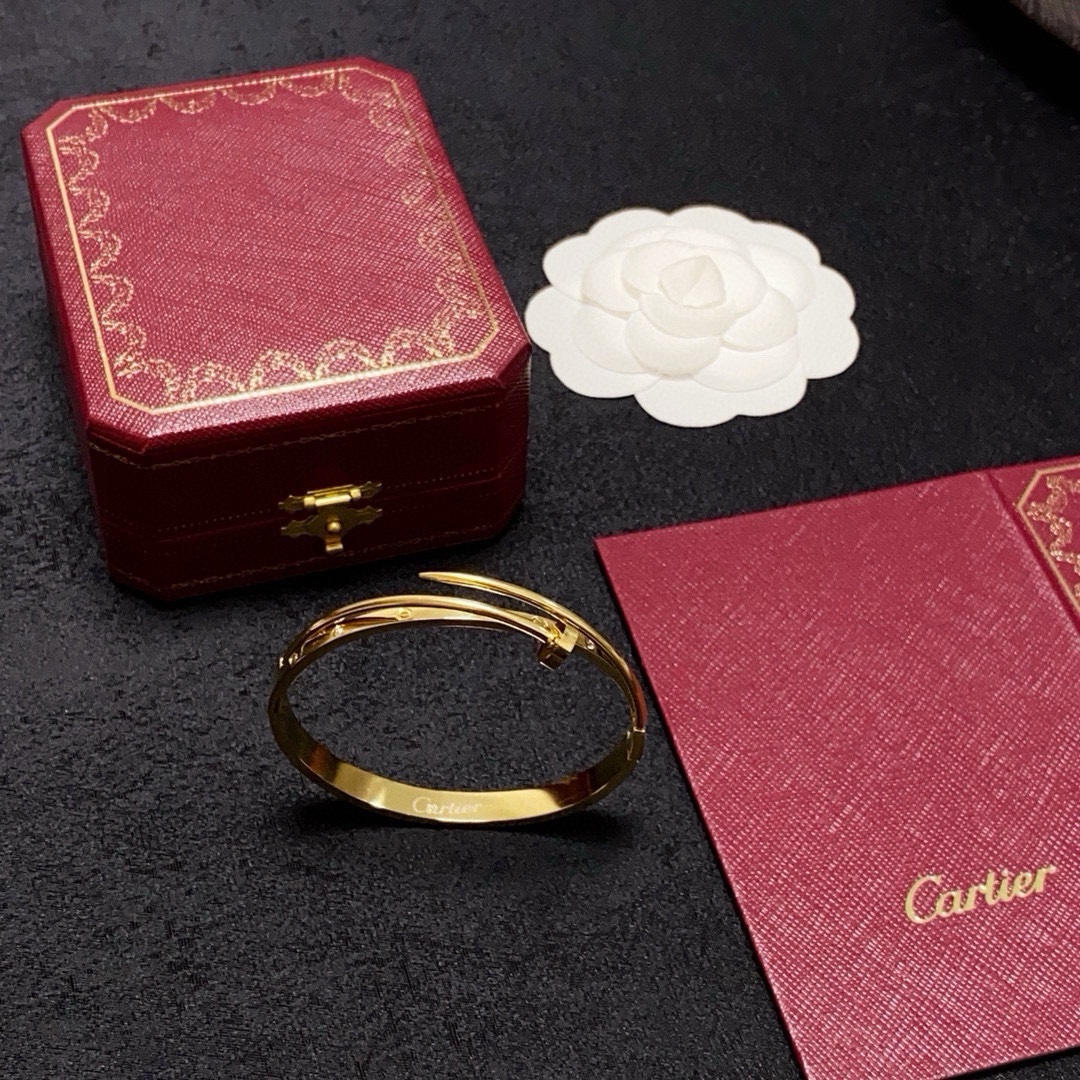 Cartier Juste un Clou bracelet 18k yellow gold with clear diamond accents 17