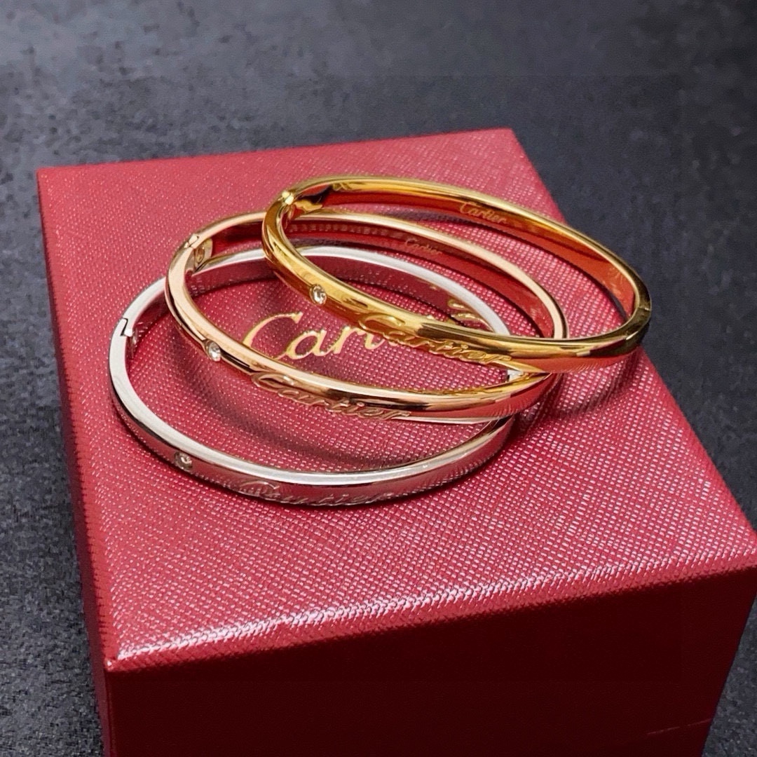 Cartier C de Cartier Signature Bangle bracelet 18k white gold 18k yellow gold 18k rose gold clear diamond 17
