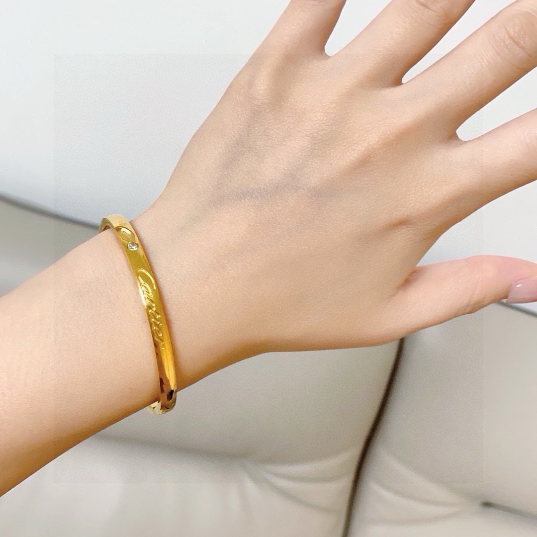 Cartier C de Cartier Signature Bangle bracelet 18k white gold 18k yellow gold 18k rose gold clear diamond 17