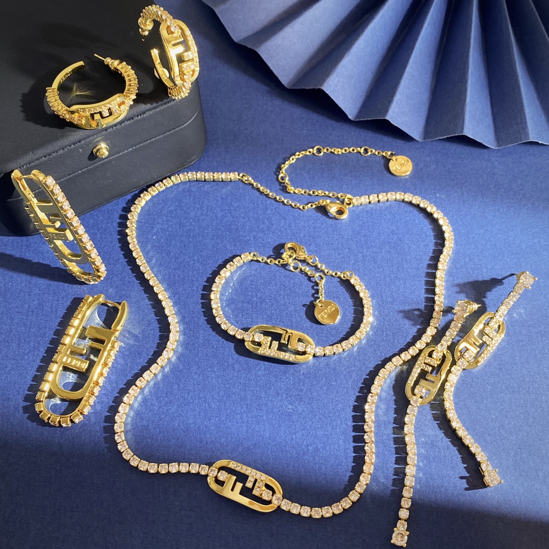Fendi O Lock earrings gold-tone metal with clear crystal accents silver-tone metal with clear crystal accents 3 5cm length
