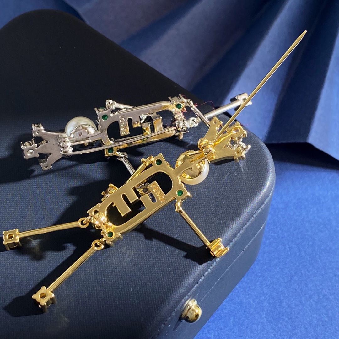 Fendi O Lock brooch gold-tone metal with cream resin pearl pink peridot green and clear faceted crystals 6cm height