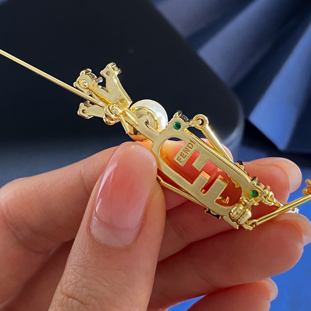 Fendi O Lock brooch gold-tone metal with cream resin pearl pink peridot green and clear faceted crystals 6cm height