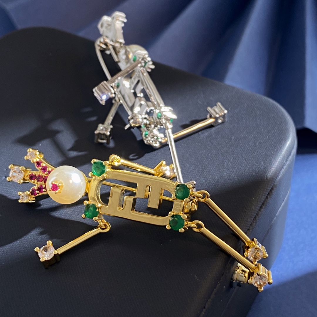 Fendi O Lock brooch gold-tone metal with cream resin pearl pink peridot green and clear faceted crystals 6cm height