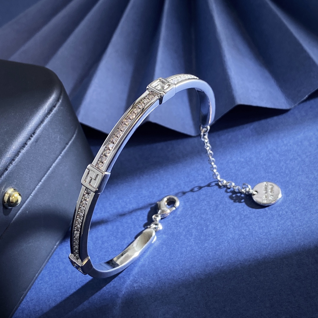 Fendi Forever FENDI bracelet gold-tone metal with clear crystal accents silver-tone metal with clear crystal accents adjustable chain length