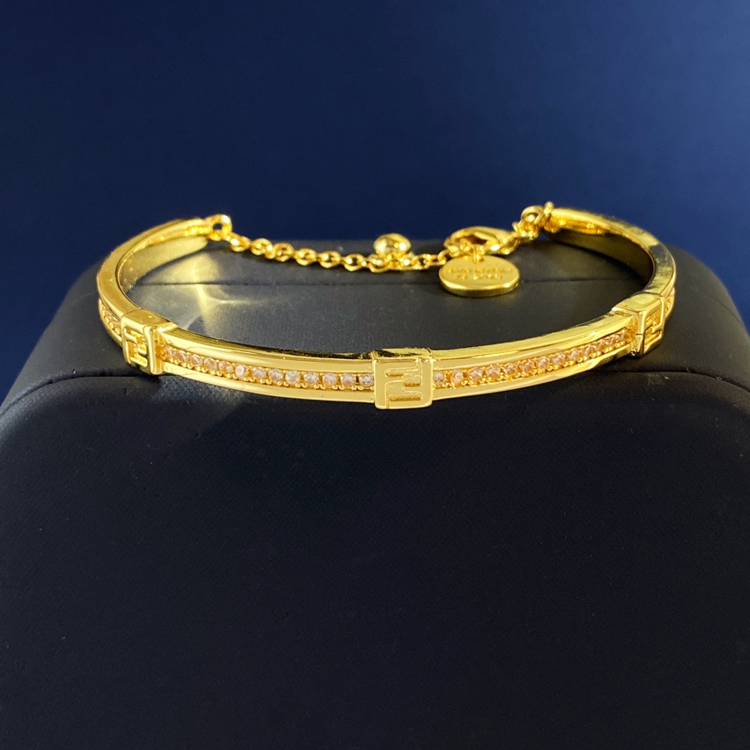 Fendi Forever FENDI bracelet gold-tone metal with clear crystal accents silver-tone metal with clear crystal accents adjustable chain length