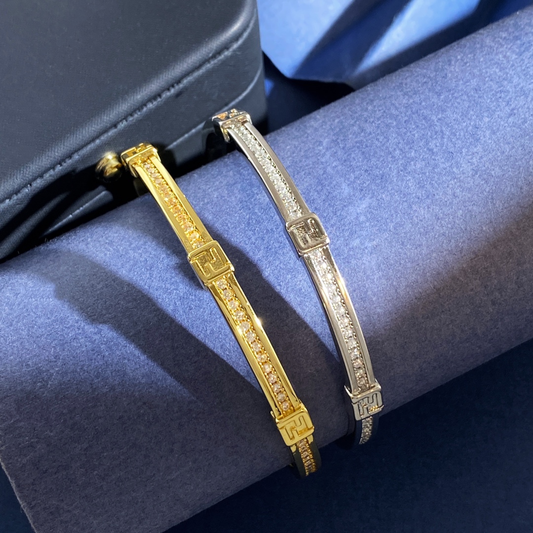 Fendi Forever FENDI bracelet gold-tone metal with clear crystal accents silver-tone metal with clear crystal accents adjustable chain length