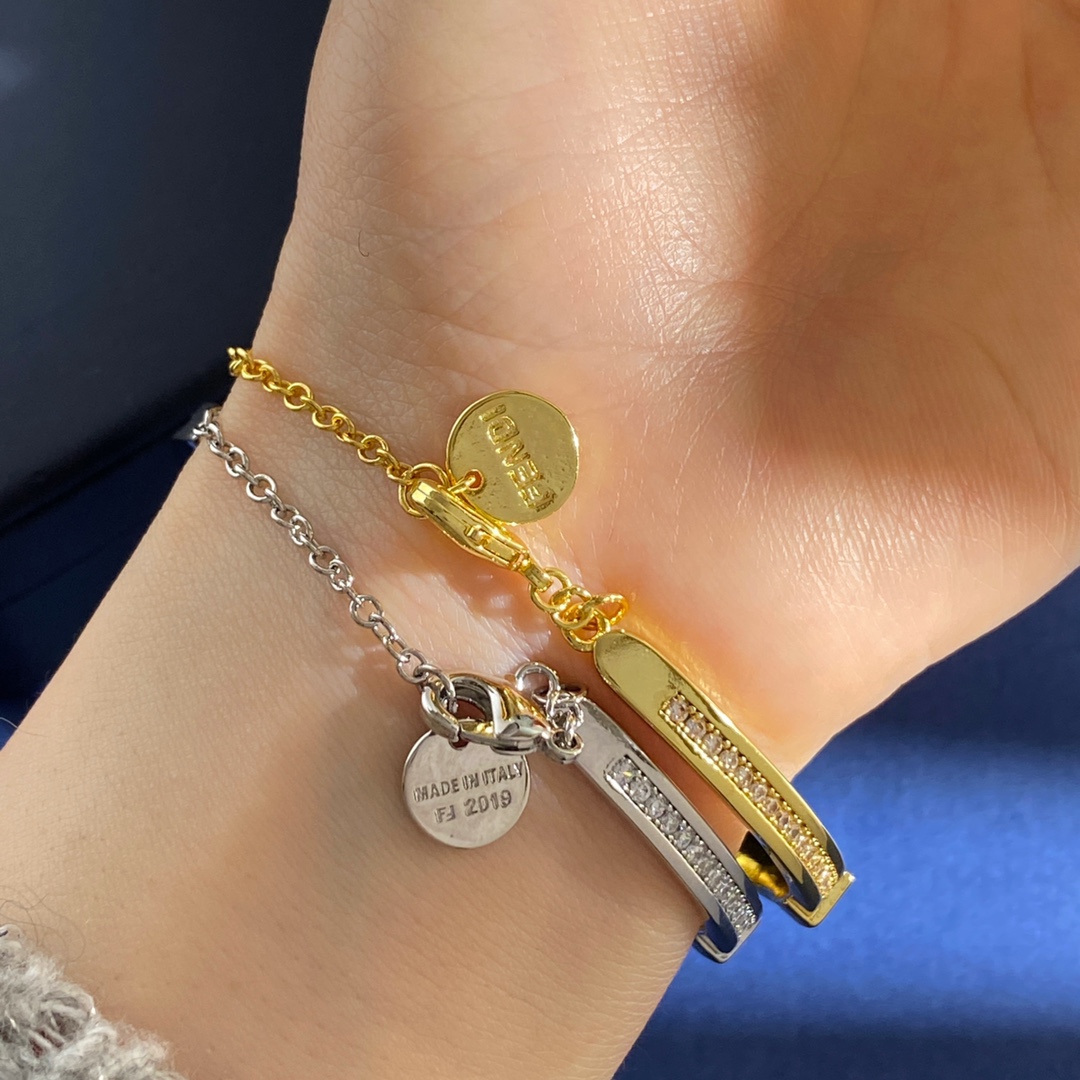 Fendi Forever FENDI bracelet gold-tone metal with clear crystal accents silver-tone metal with clear crystal accents adjustable chain length