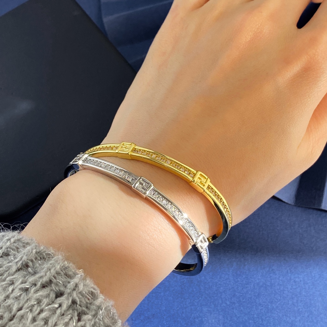 Fendi Forever FENDI bracelet gold-tone metal with clear crystal accents silver-tone metal with clear crystal accents adjustable chain length
