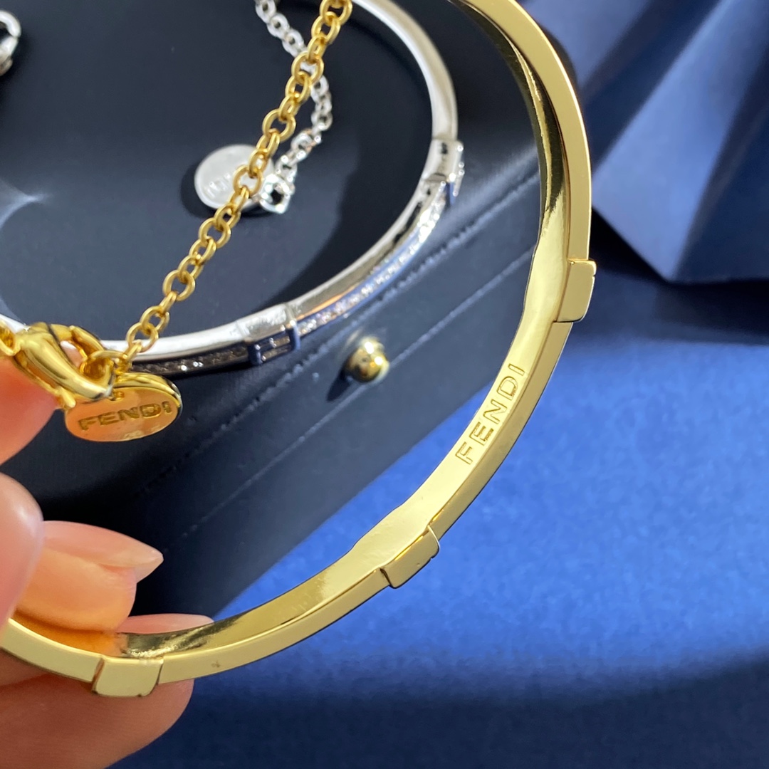 Fendi Forever FENDI bracelet gold-tone metal with clear crystal accents silver-tone metal with clear crystal accents adjustable chain length