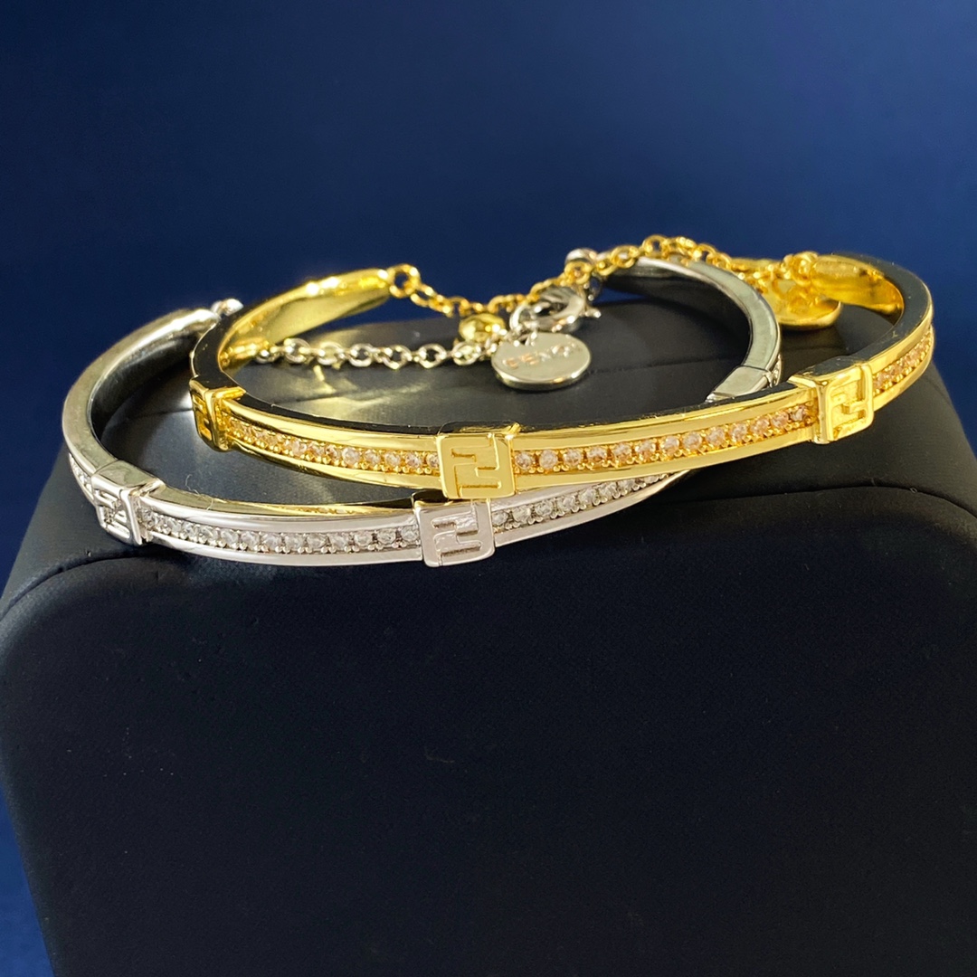 Fendi Forever FENDI bracelet gold-tone metal with clear crystal accents silver-tone metal with clear crystal accents adjustable chain length