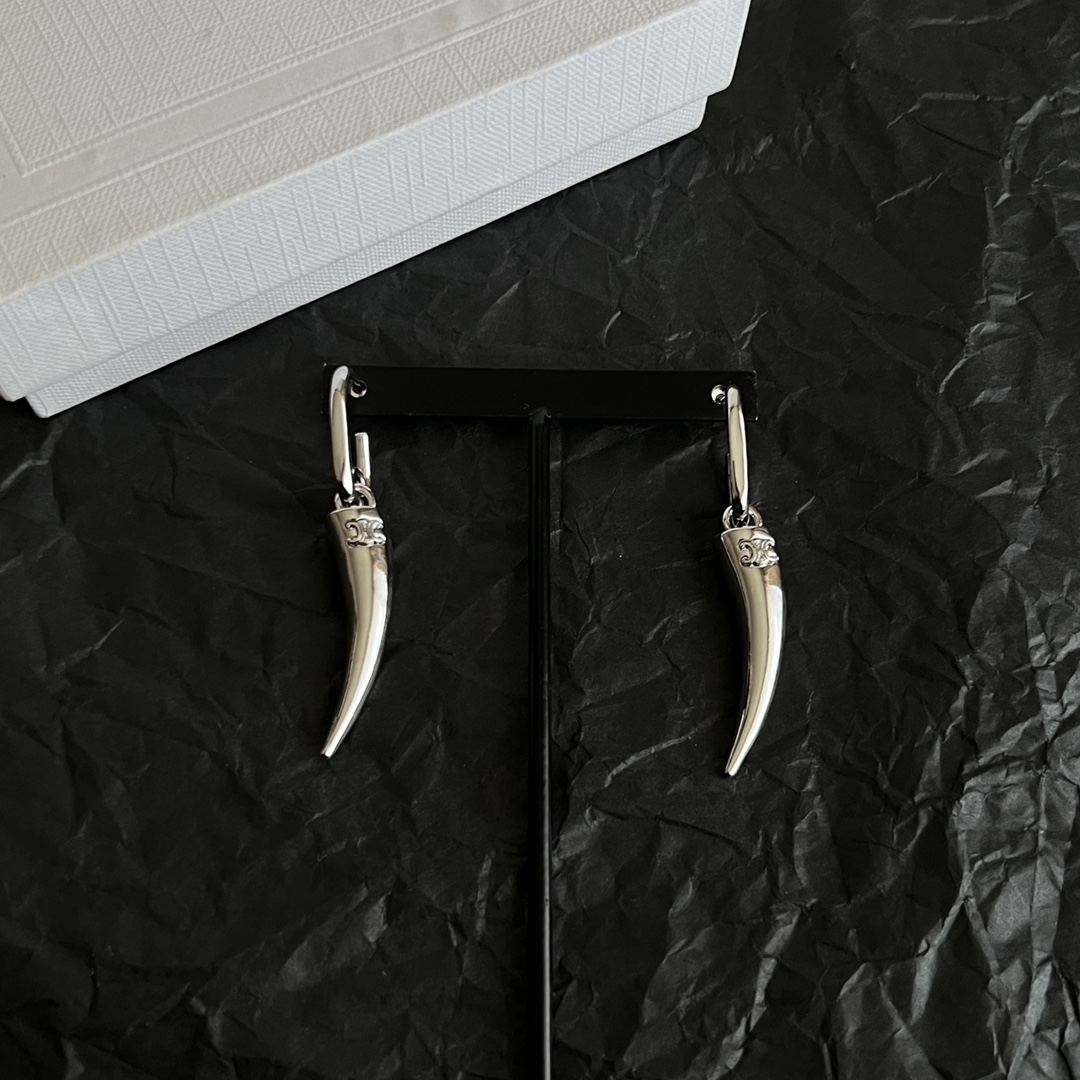 Celine Triomphe Horn Drop Earrings earrings Available in polished gold-tone metal and polished silver-tone metal no gemstones One Size drop length approx 4 5cm