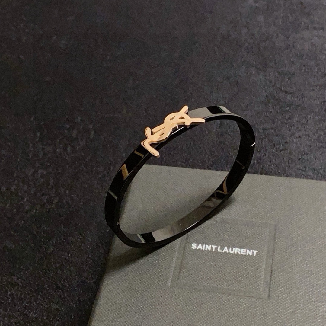 Saint Laurent Cassandre YSL Logo Bangle bracelet black enamel with gold-tone metal logo 17cm inner circumference