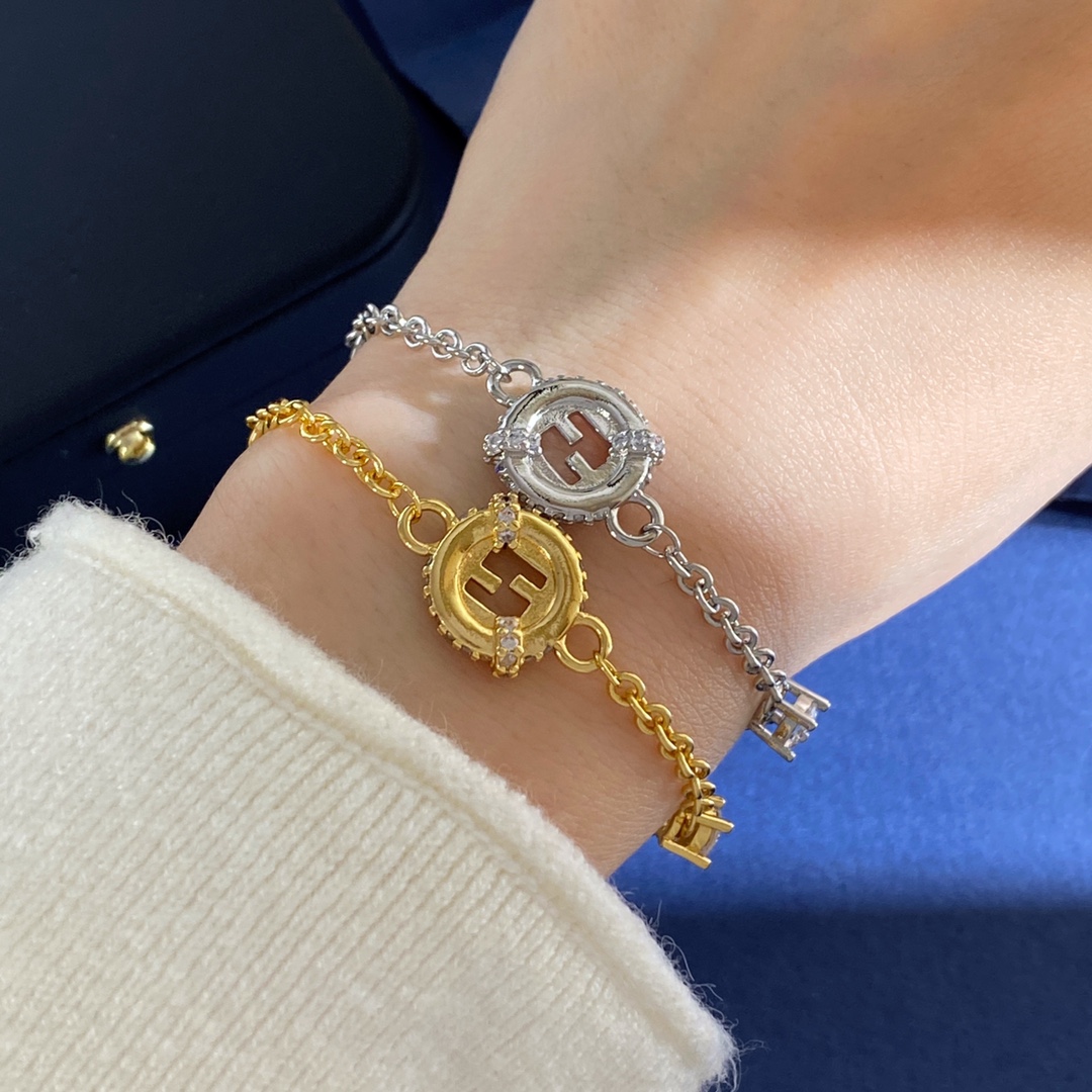 Fendi EverRound bracelet gold-tone metal with clear cubic zirconia accents adjustable 16-19cm