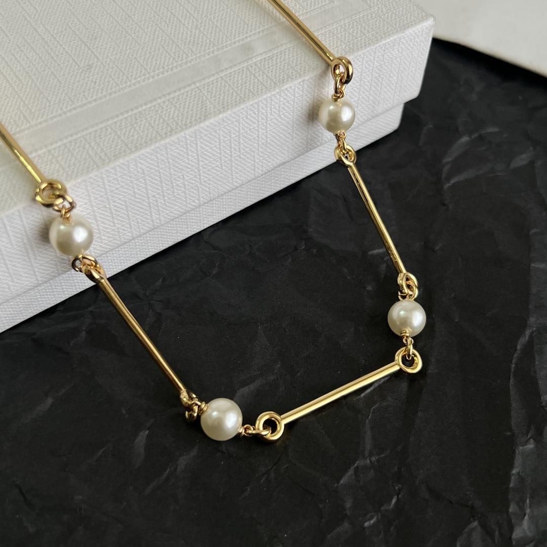 Celine Triomphe Pearl Bar Chain bracelet gold-tone metal with white pearls 18cm