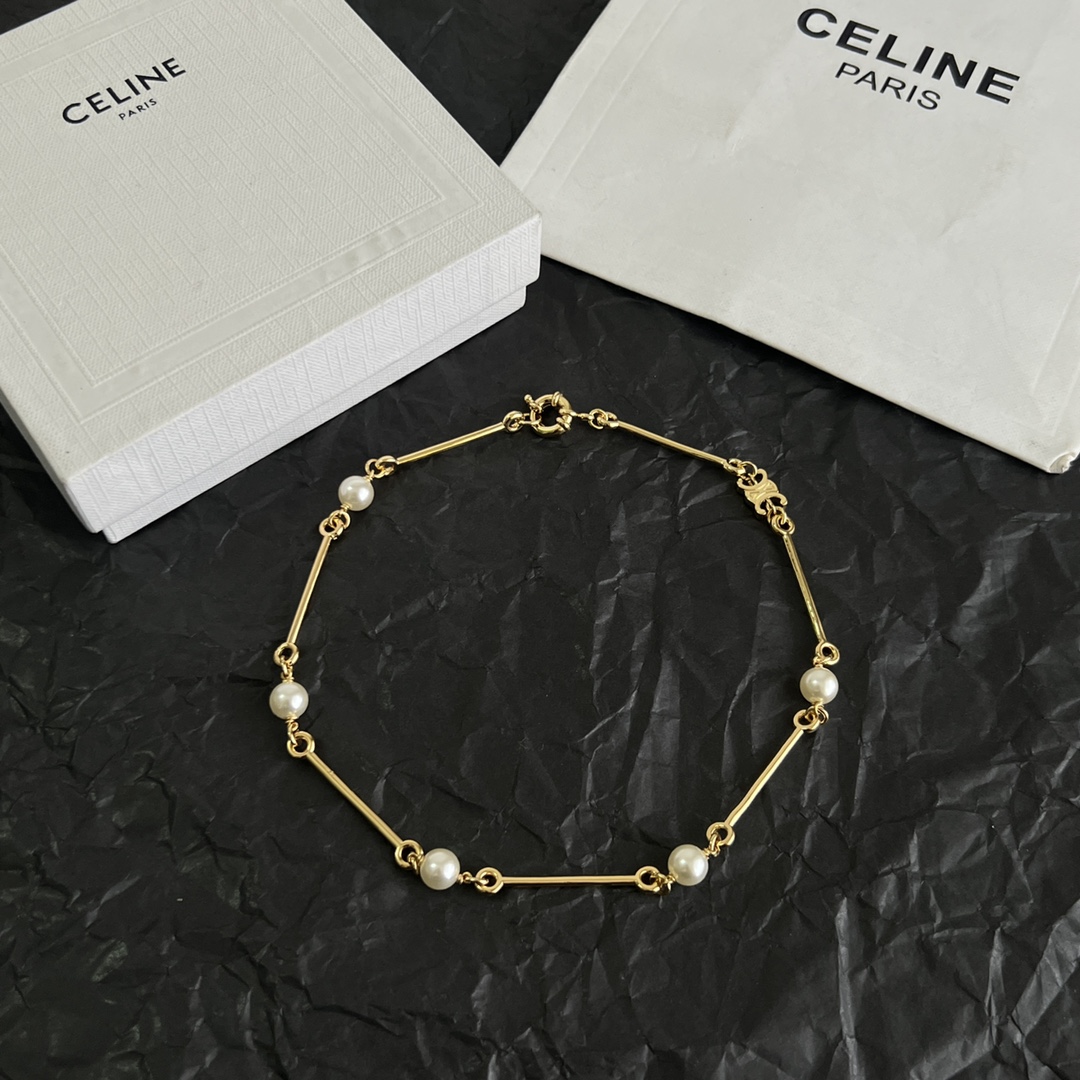 Celine Triomphe Pearl Bar Chain bracelet gold-tone metal with white pearls 18cm