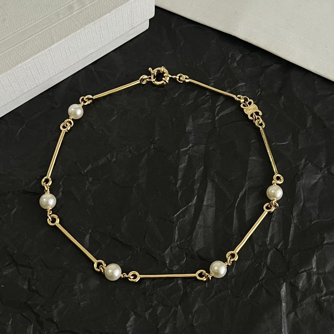Celine Triomphe Pearl Bar Chain bracelet gold-tone metal with white pearls 18cm