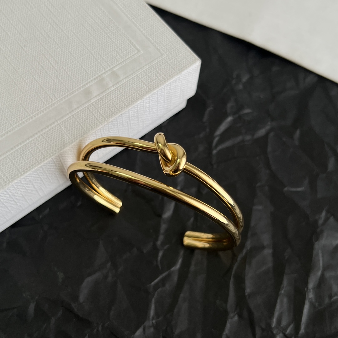 Celine Knot Double Band Cuff bracelet Gold-tone metal no gemstones One Size open cuff approx 6cm inner diameter