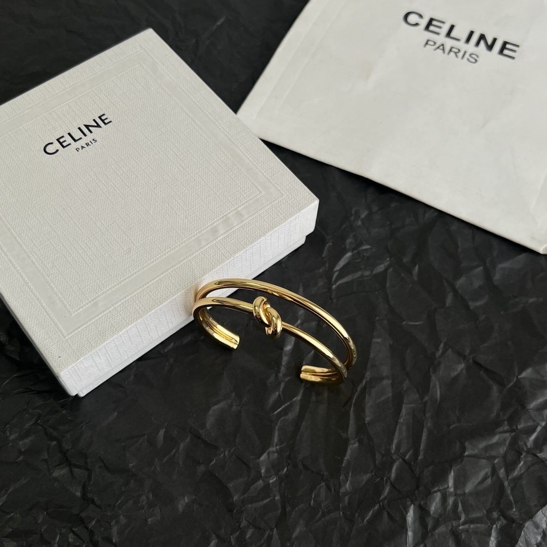 Celine Knot Double Band Cuff bracelet Gold-tone metal no gemstones One Size open cuff approx 6cm inner diameter
