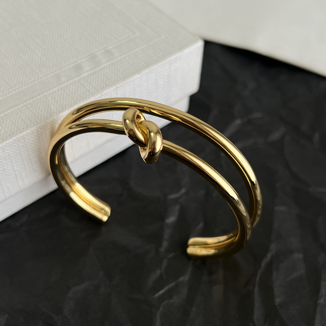 Celine Knot Double Band Cuff bracelet Gold-tone metal no gemstones One Size open cuff approx 6cm inner diameter