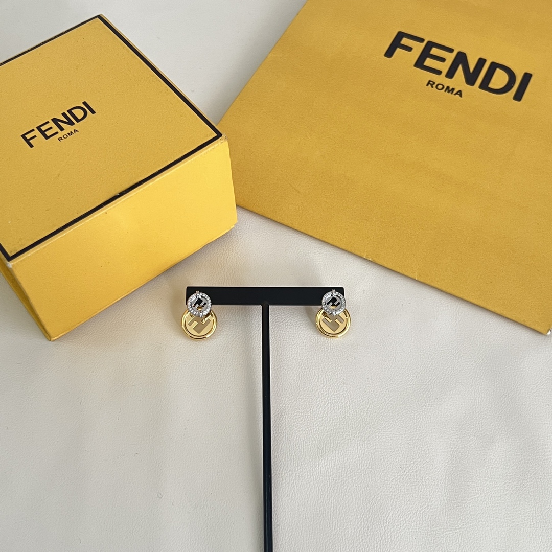 Fendi F Is Fendi earrings gold-tone metal silver-tone metal with clear crystal accents 1 2cm diameter