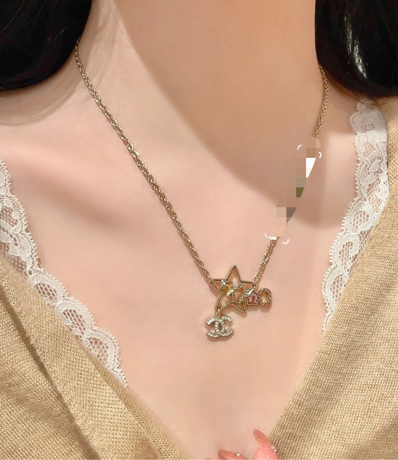 Chanel CC Star Charm necklace gold-tone metal with clear crystals pink and yellow star accents 42cm with 5cm extender