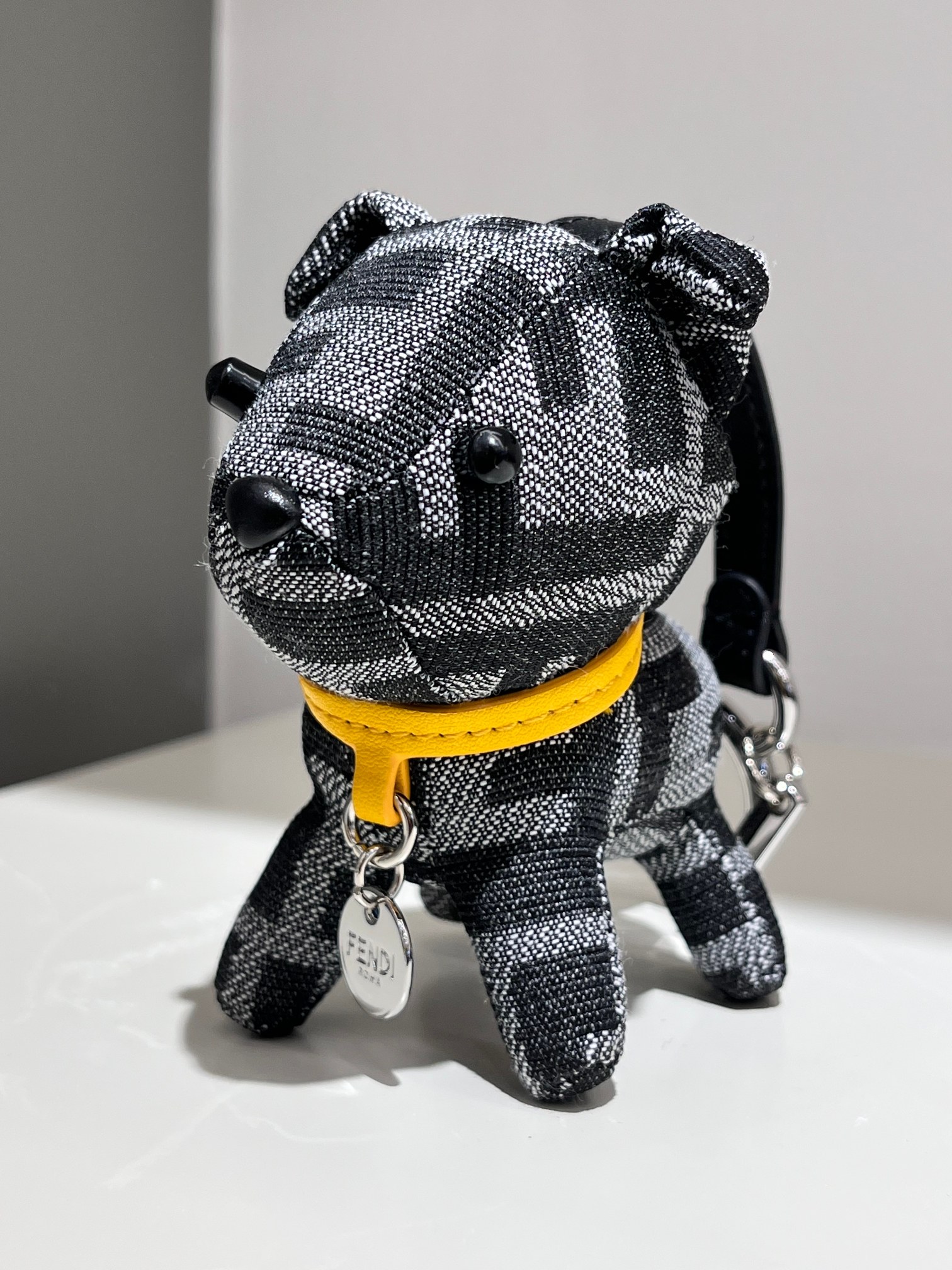 Fendi FF Monogram Puppy Bag Charm pendant Tobacco brown and black FF jacquard fabric tan leather collar silver-tone metal hardware black leather strap black plastic accents 10cm charm with 8cm