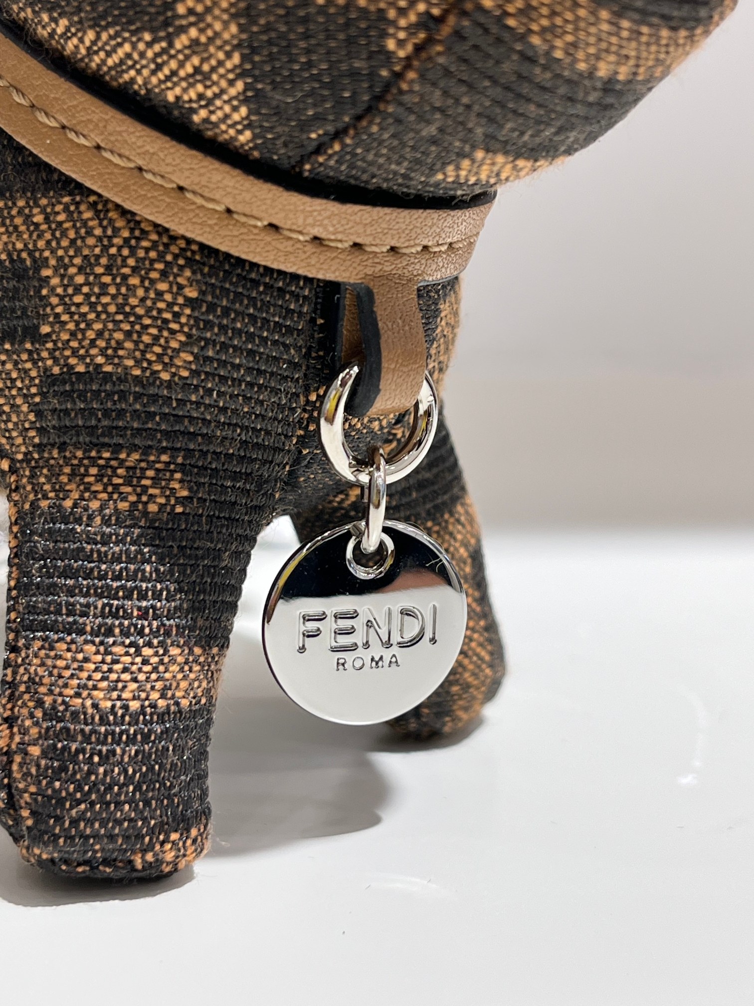 Fendi FF Monogram Dog Charm pendant tobacco brown and black FF jacquard canvas silver-tone metal hardware black leather strap tan leather collar black resin accents 10cm total length with