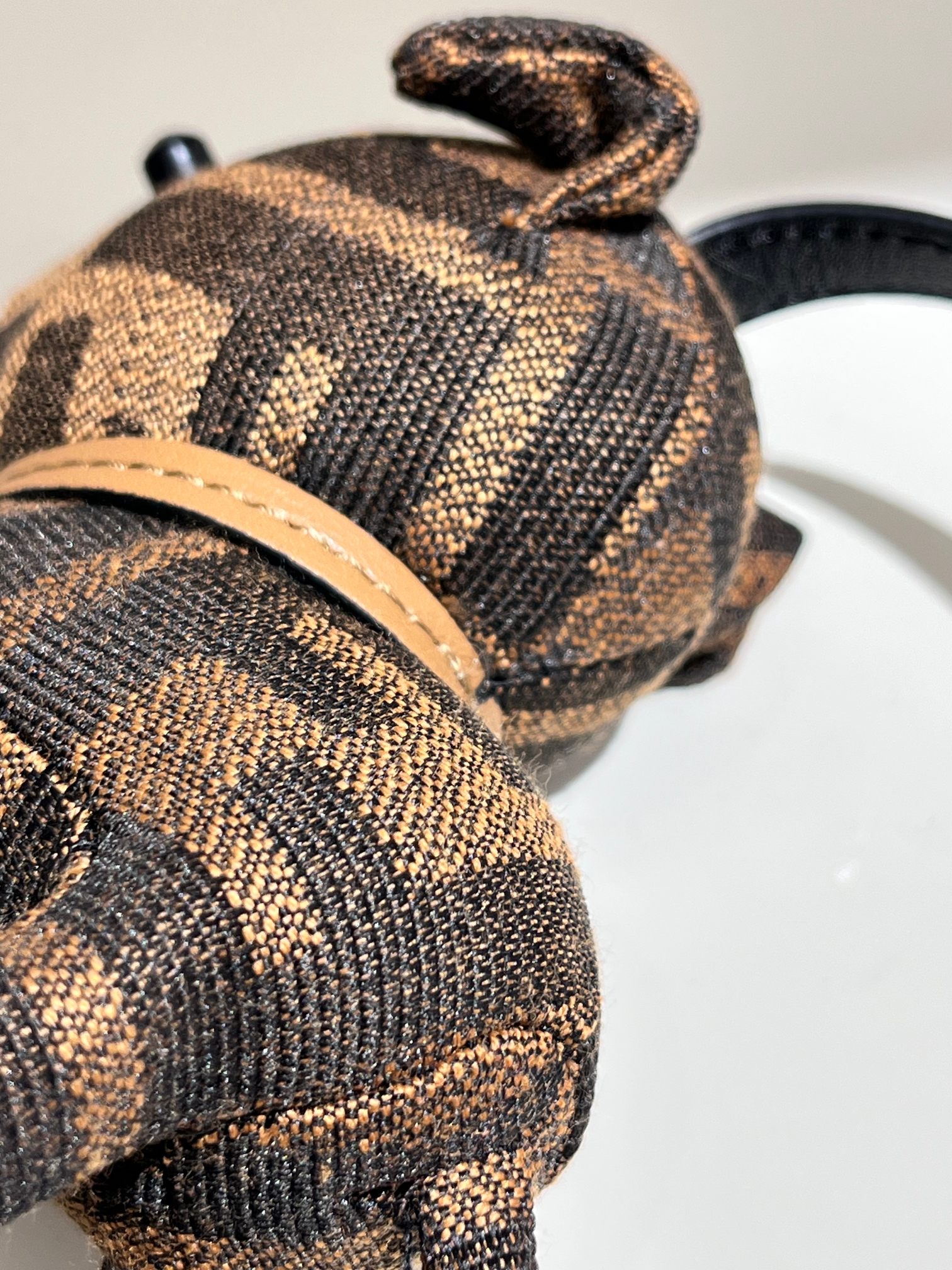 Fendi FF Monogram Dog Charm pendant tobacco brown and black FF jacquard canvas silver-tone metal hardware black leather strap tan leather collar black resin accents 10cm total length with