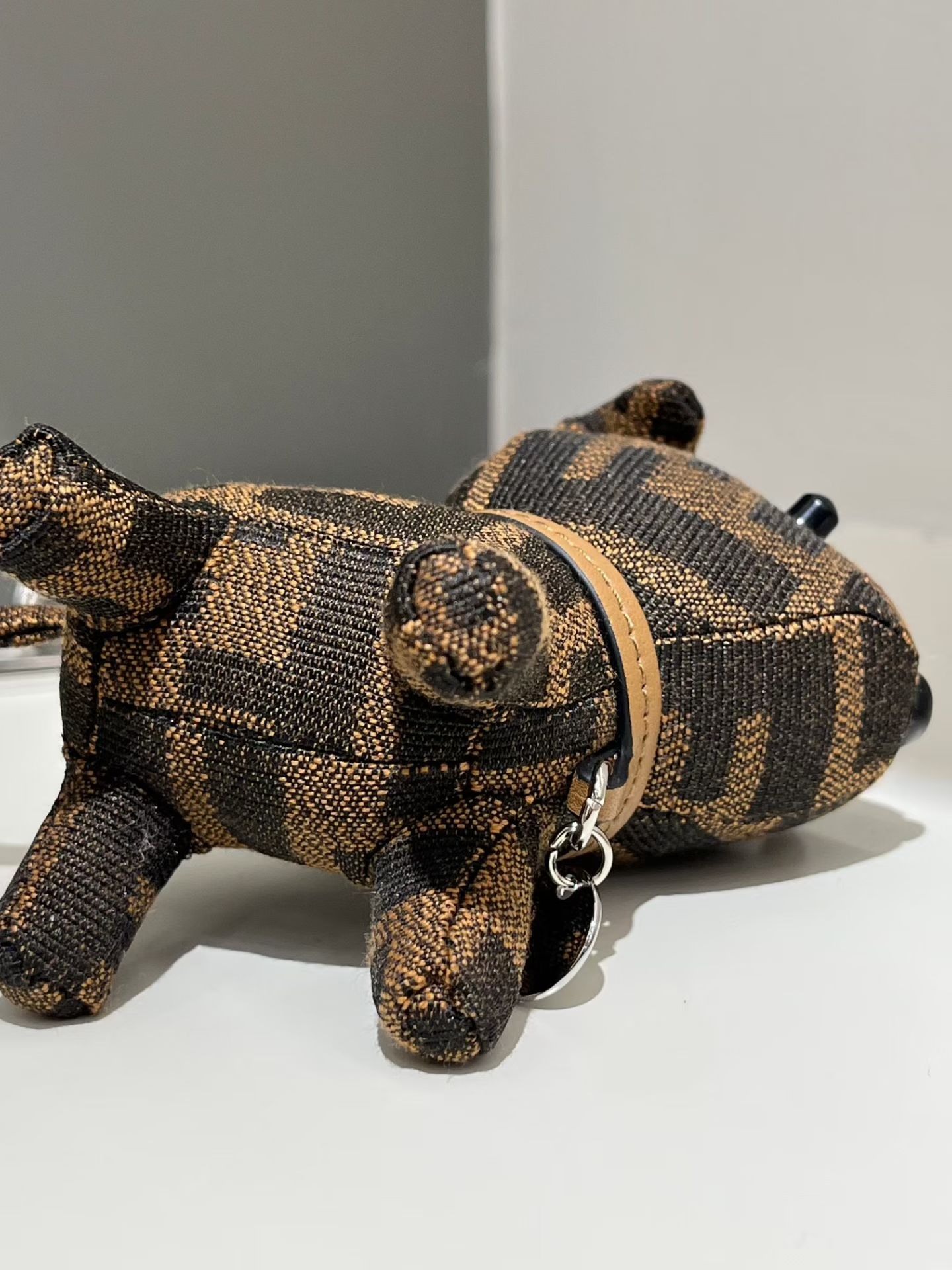 Fendi FF Monogram Dog Charm pendant tobacco brown and black FF jacquard canvas silver-tone metal hardware black leather strap tan leather collar black resin accents 10cm total length with