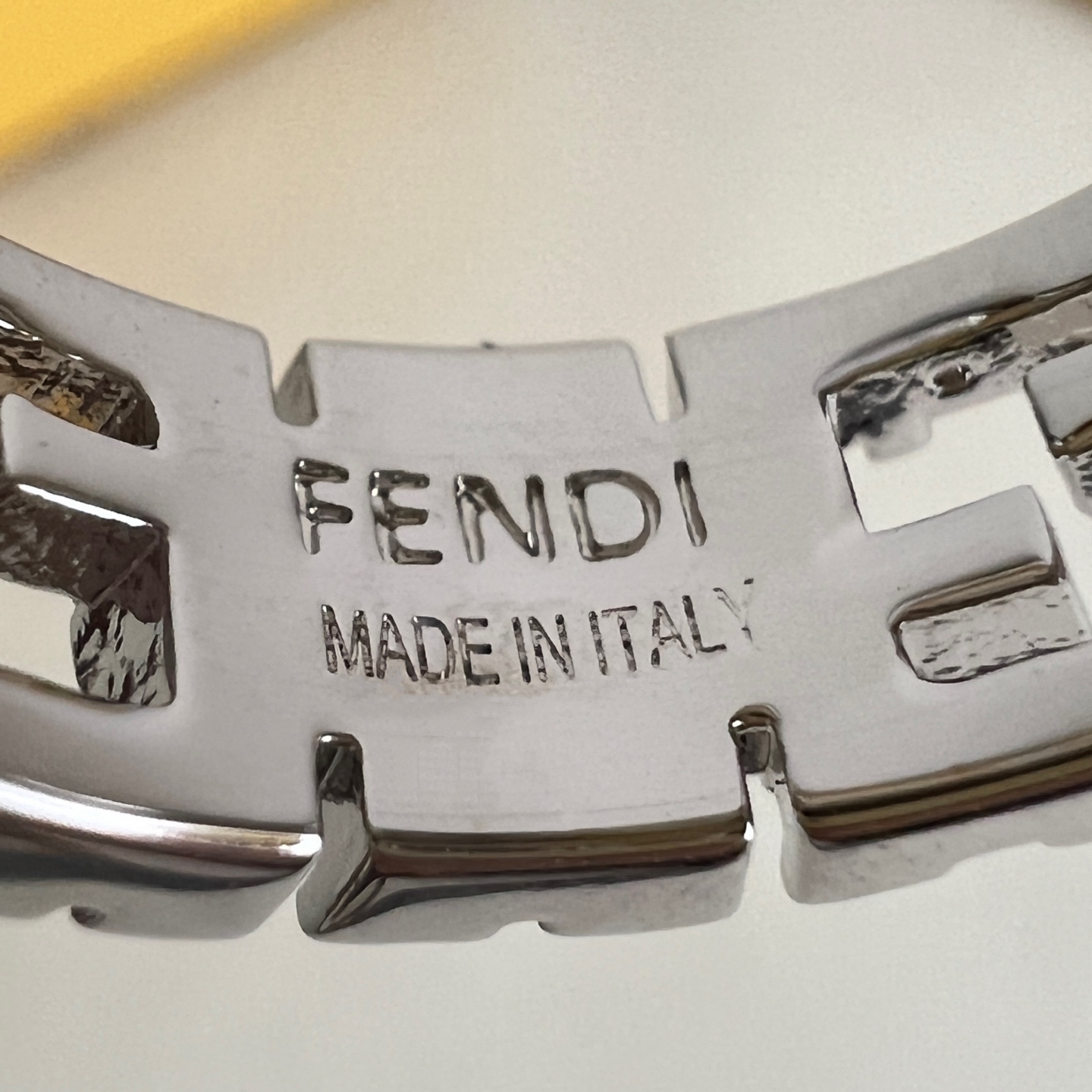 Fendi FF Logo Textured Band Ring ring Silver-tone metal with clear crystal accents US 7
