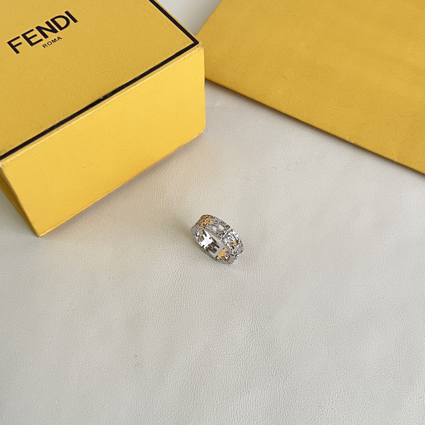 Fendi FF Logo Textured Band Ring ring Silver-tone metal with clear crystal accents US 7