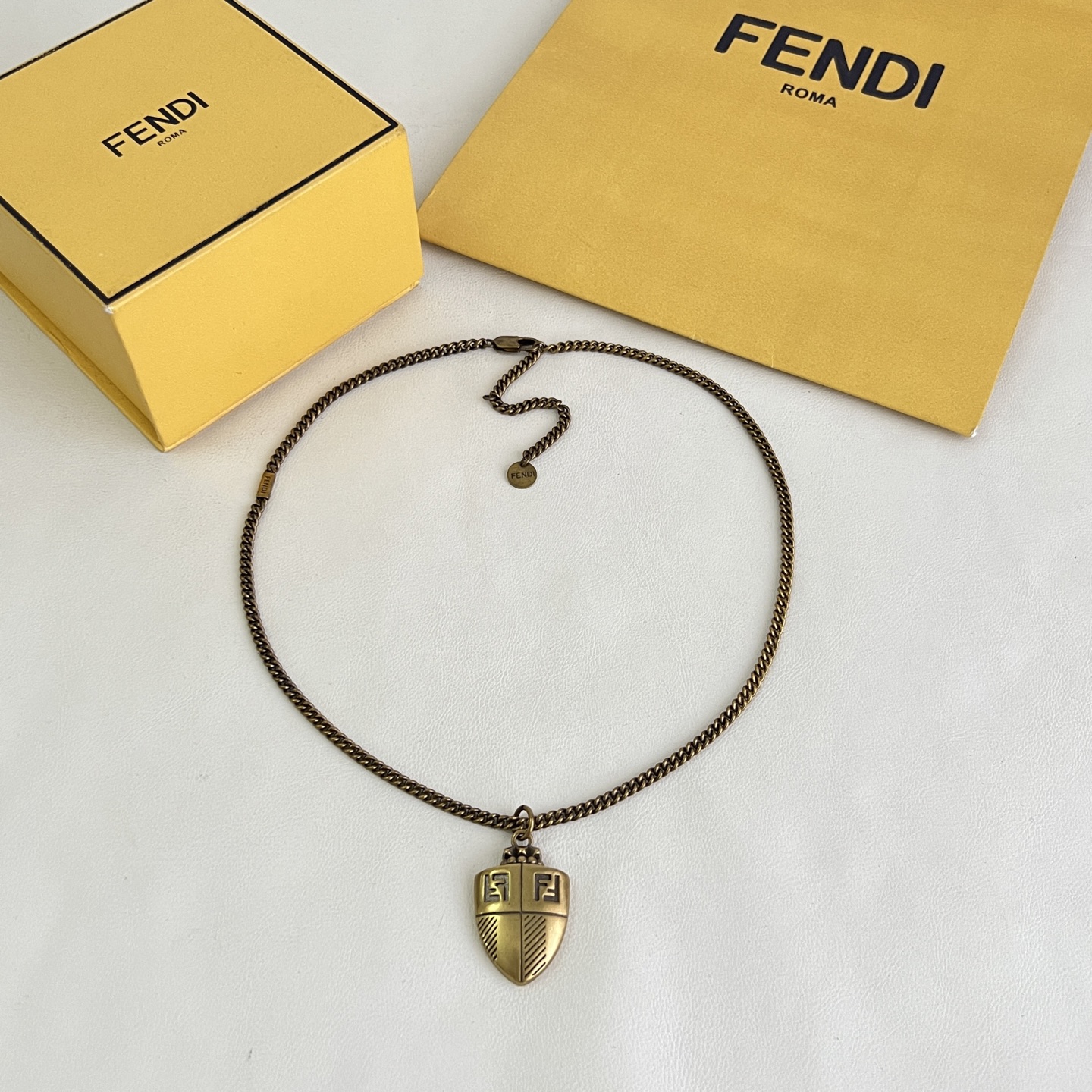 Fendi FF Shield Pendant necklace antique brass gold 45cm