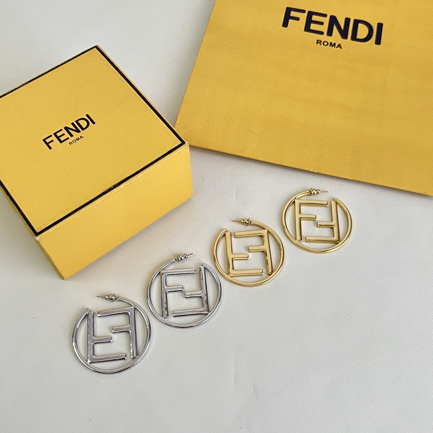 Fendi FF Logo Hoop earrings gold-tone metal no gemstones 4cm diameter