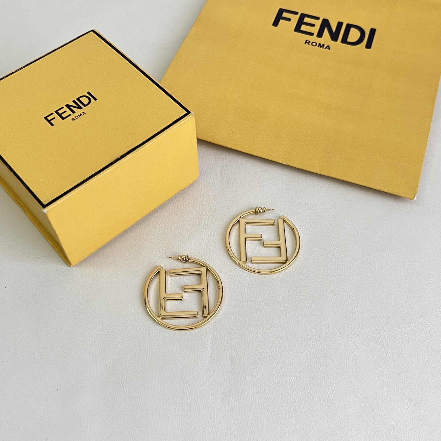 Fendi FF Logo Hoop earrings gold-tone metal no gemstones 4cm diameter