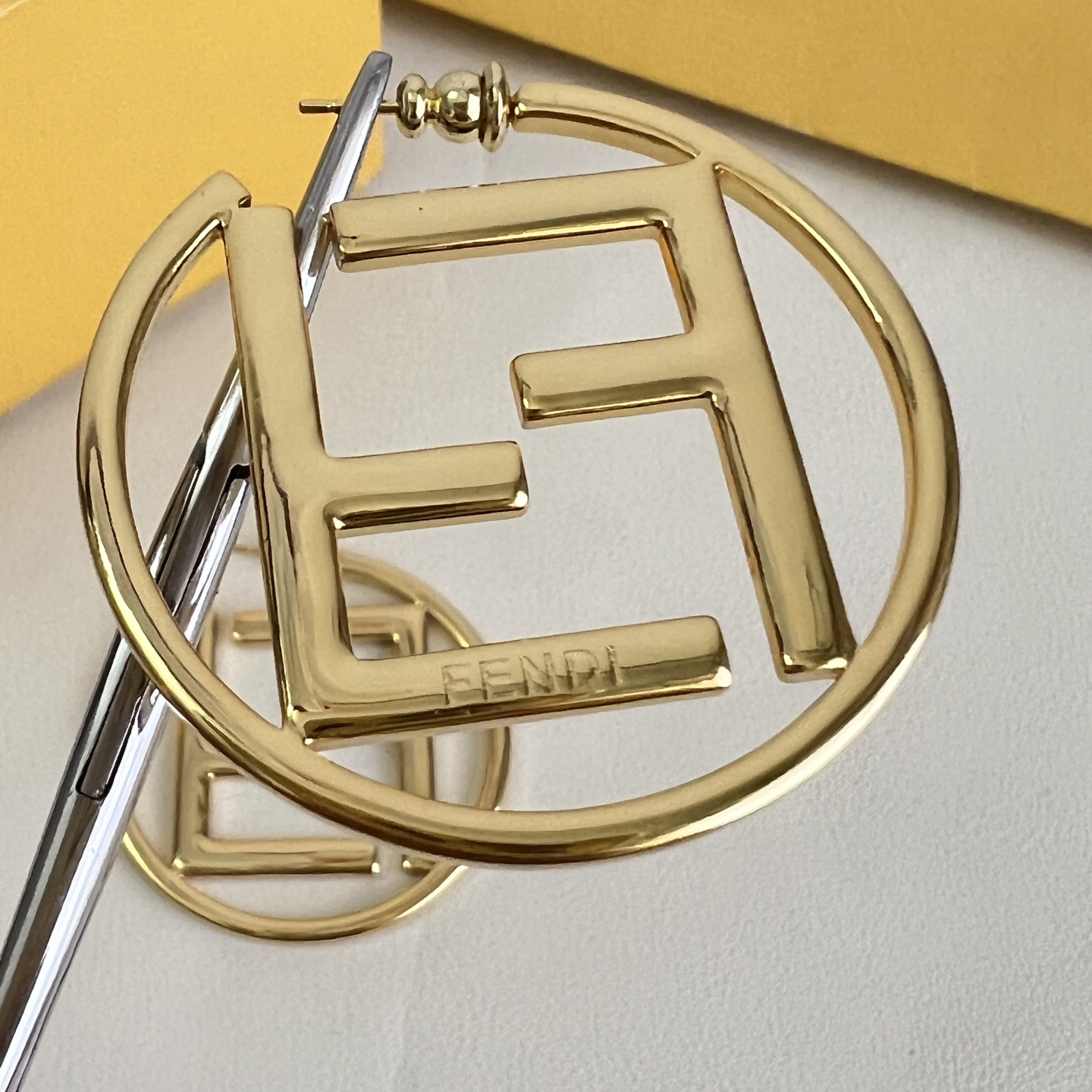 Fendi FF Logo Hoop earrings gold-tone metal no gemstones 4cm diameter