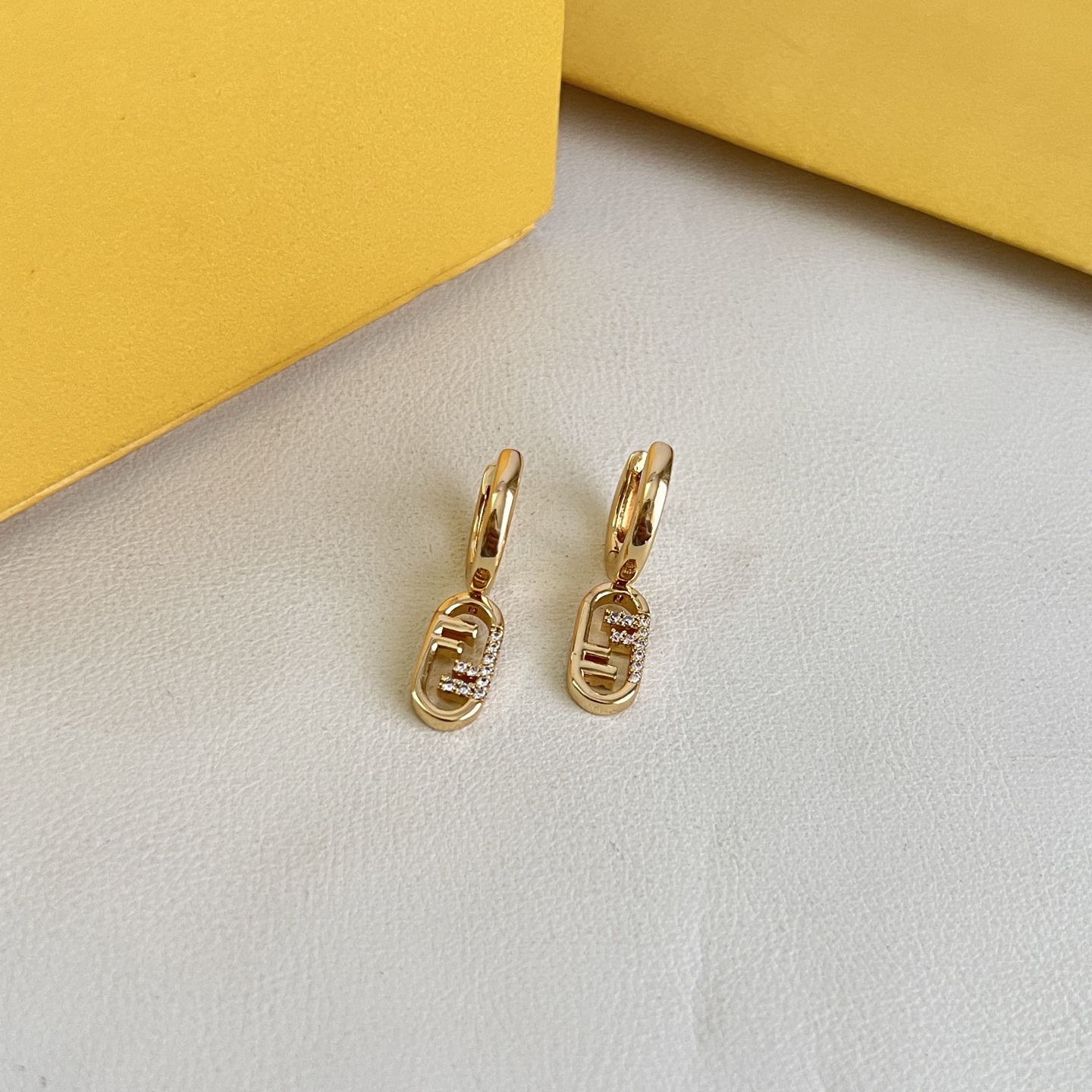 Fendi O Lock earrings gold-tone metal with clear crystal accents 1 5cm drop length
