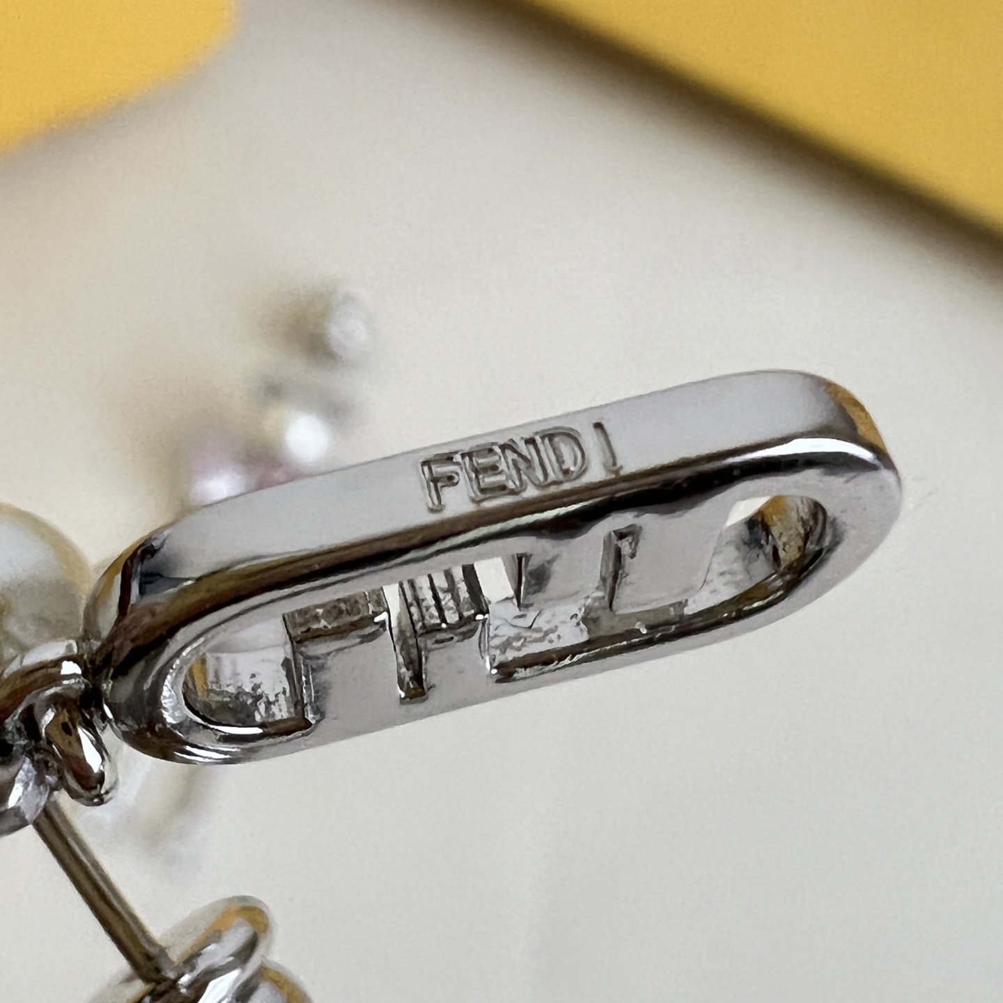 Fendi FF Robot Asymmetric Earrings earrings Available in two variants gold-tone metal with white faux pearl clear pave crystals and pink accent stone silver-tone metal with white faux pearl clear pave crystals and pink accent stone One Size drop length approx 3 5cm