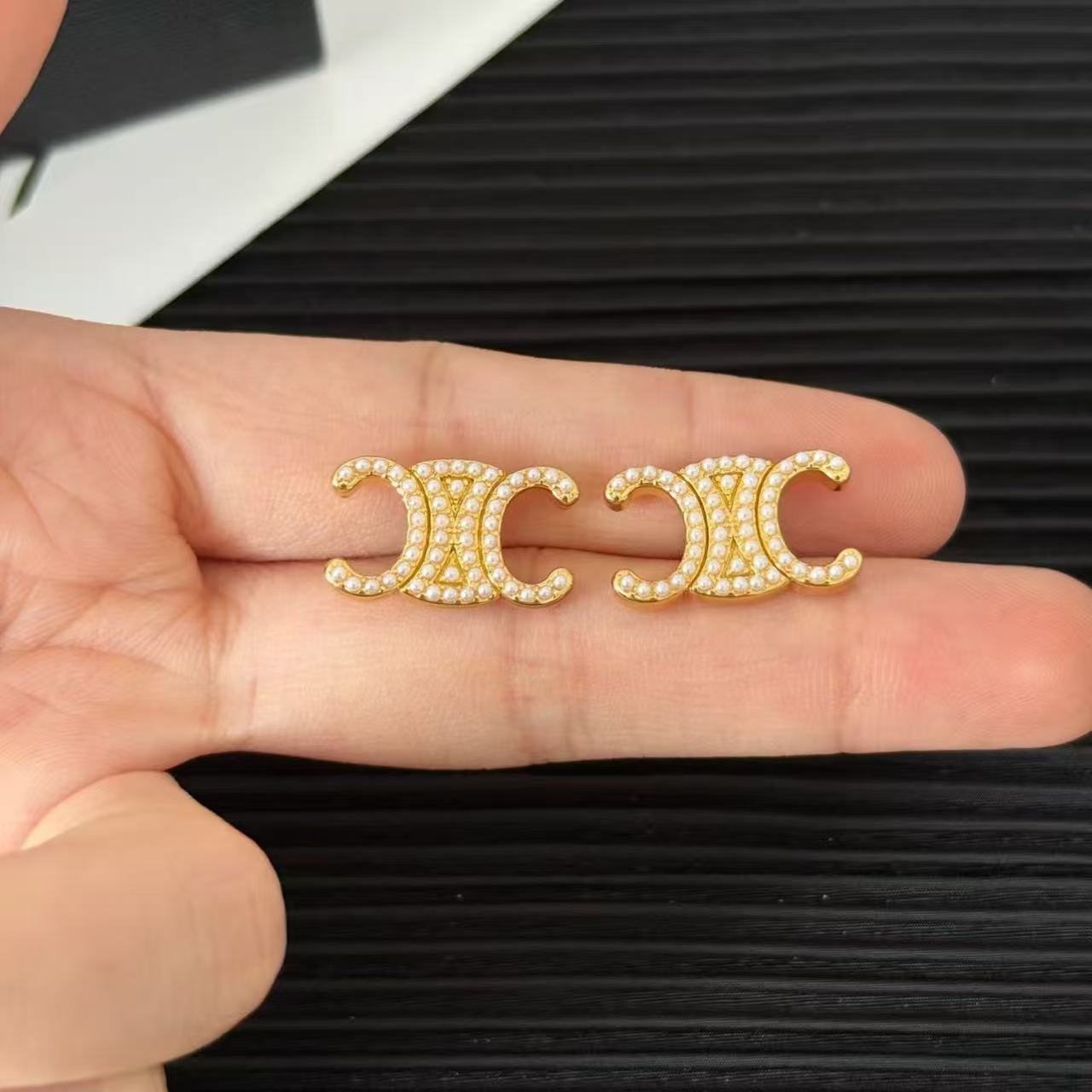 Celine Triomphe Pearl Stud Earrings earrings gold-tone metal with cream faux pearl accents 1 5cm width per earring
