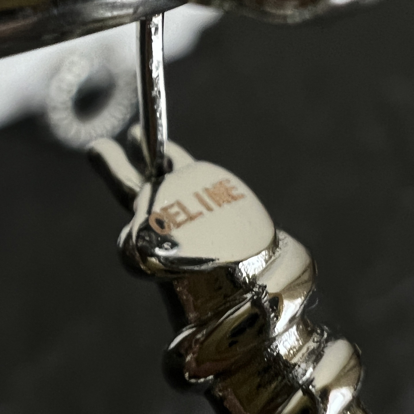 Celine Twisted Coil Hoop Earrings earrings Silver-tone metal Gold-tone metal 20mm diameter