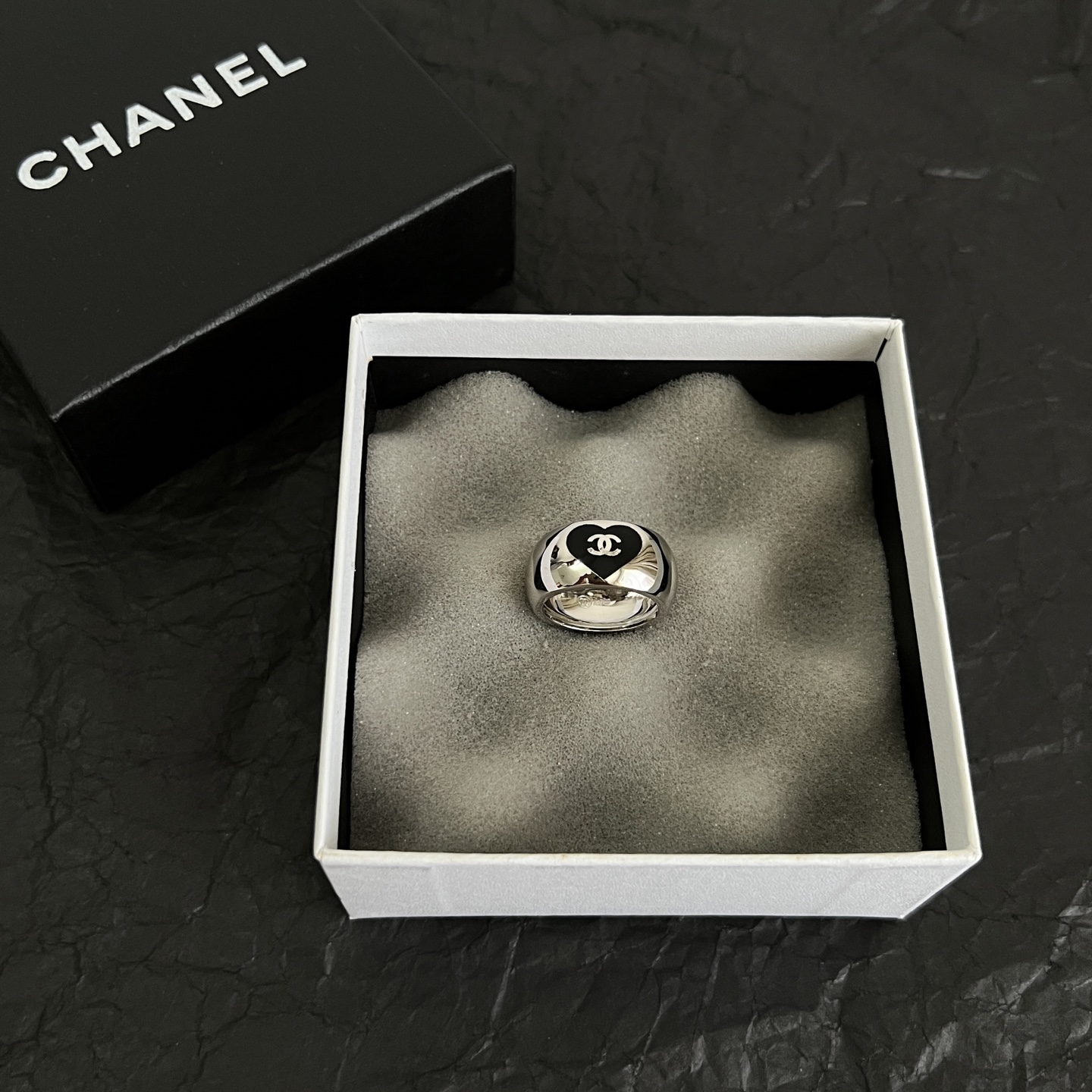 Chanel CC Heart Logo Dome Ring ring Silver-tone polished metal with black enamel heart detail US 7