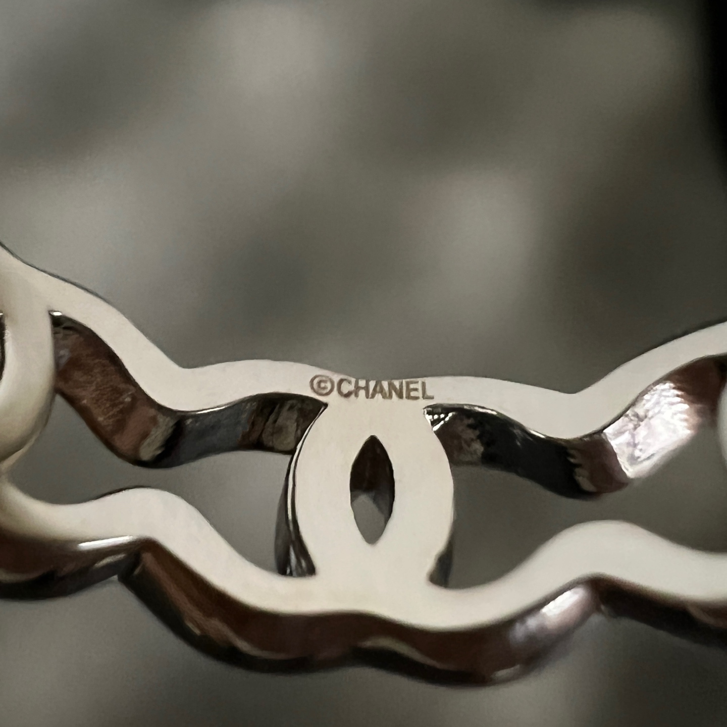 Chanel CC Logo Wavy Open Band Ring ring Silver-toned metal no accent stones US 7