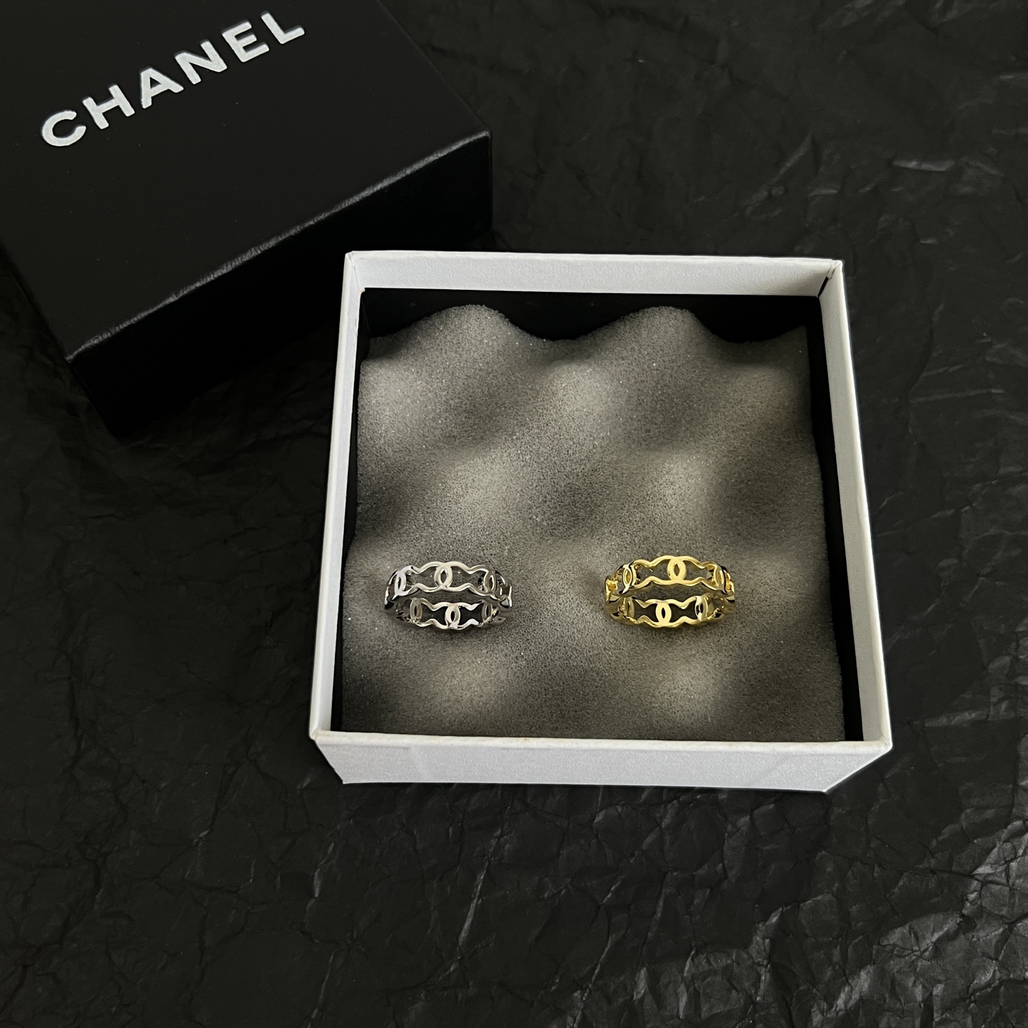 Chanel CC Logo Wavy Open Band Ring ring Silver-toned metal no accent stones US 7