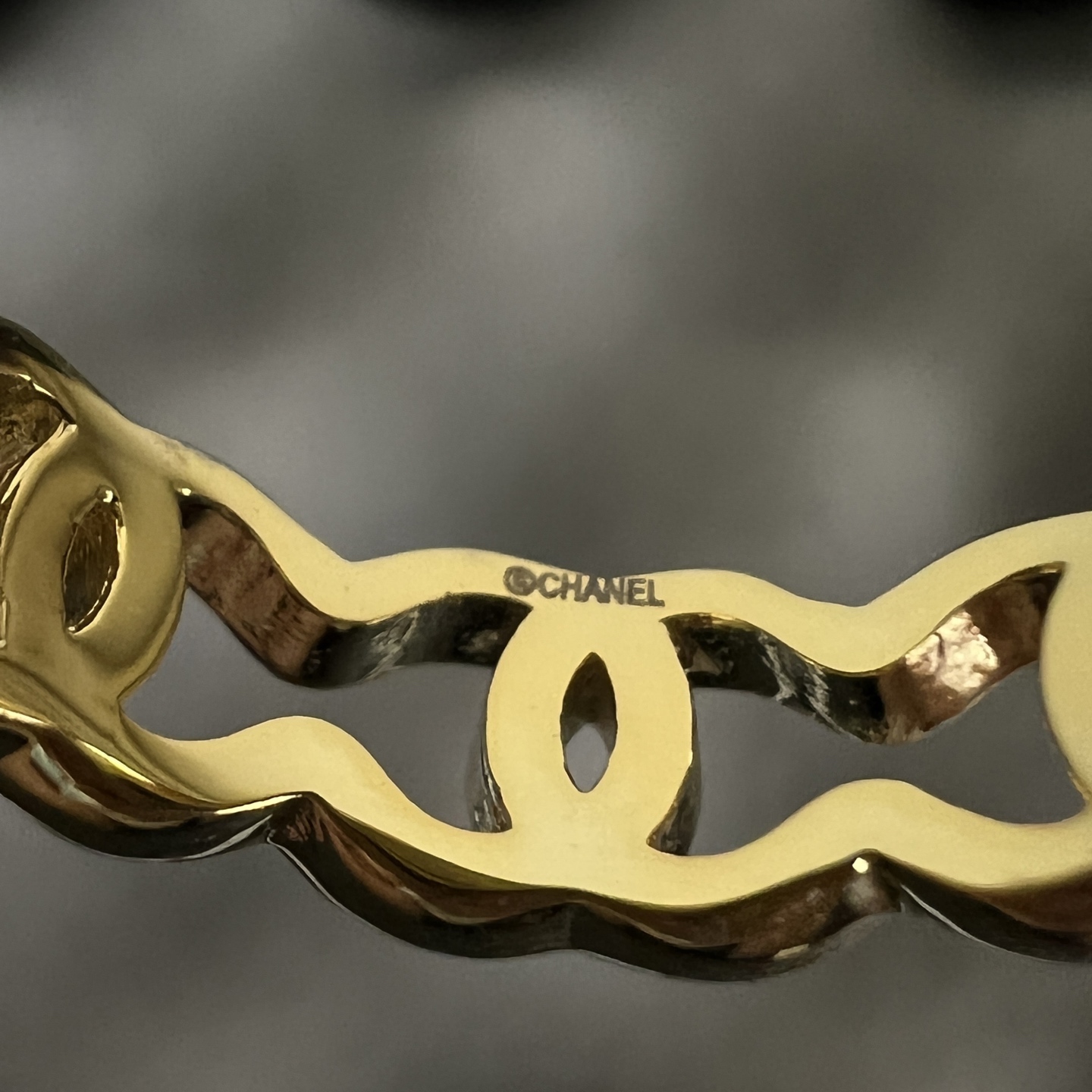 Chanel CC Logo Wavy Band Ring ring Gold-tone metal no accent stones US 7